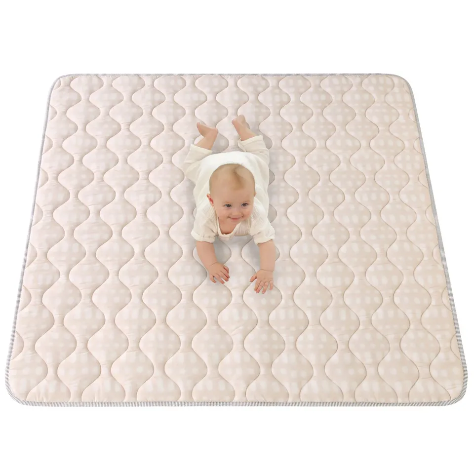 hakuna-matte-gesteppte-krabbeldecke-hygge-beige-127-cm image 1
